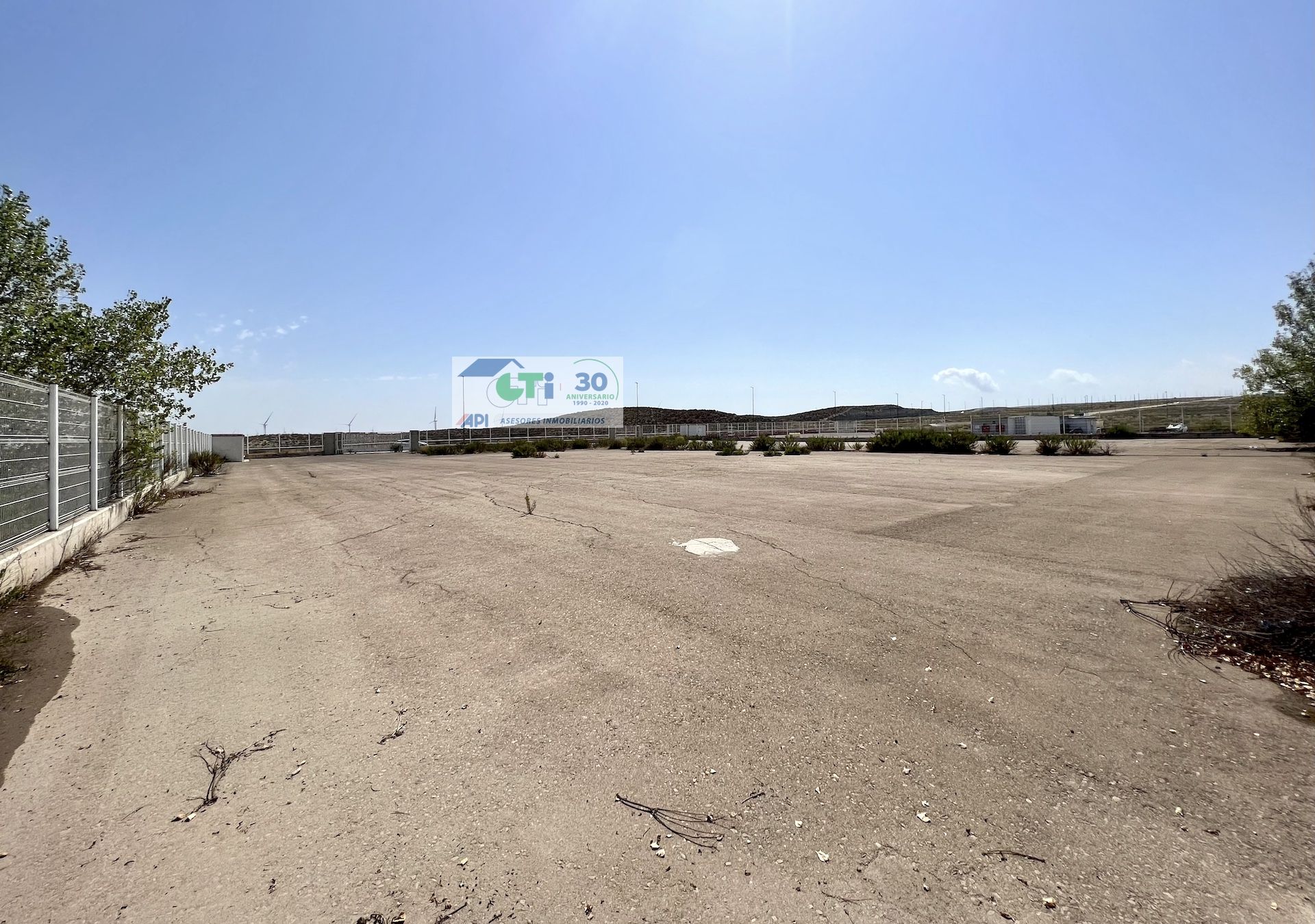 Parcela de 4112m2 asfaltada y vallada en alquiler – Parque Tecnológico del Reciclado (PTR), Zaragoza.